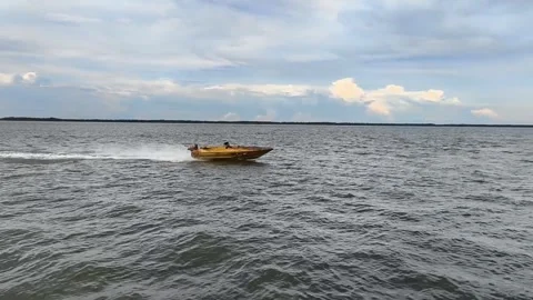 A small speed boat moving so fast Stock Footage 336675309
