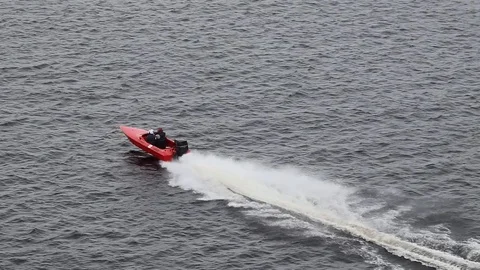 Small speed boat speeding along lake Saimaa, Lappeenranta Finland Stock Footage 112373621