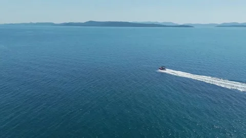 Small speedboat gliding through waves of Adriatic sea near Kornati archipelago Stock Footage 284001347