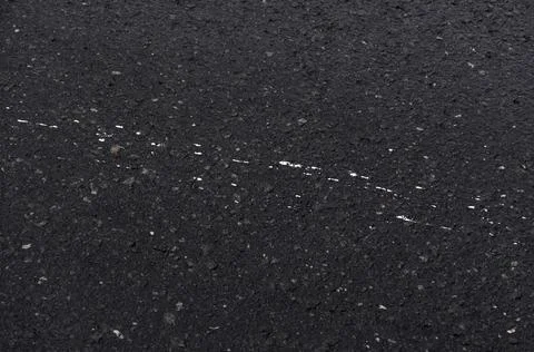 Small Splashes of white paint on asphalt good as background pattern Stock Photos