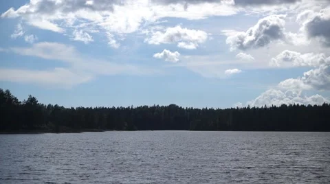 A small spot of sunlight on the surface of lake Meiko Stock Footage 66258881