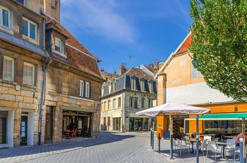 Small square in Besancon old town centre ville with old houses, medieval buil Stock Photos
