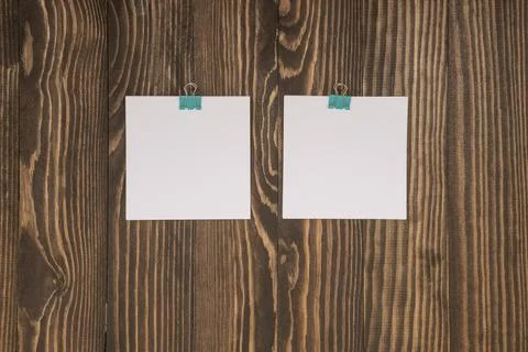 Small square sheets for notes on a wooden background , September 1 concept Stock Photos