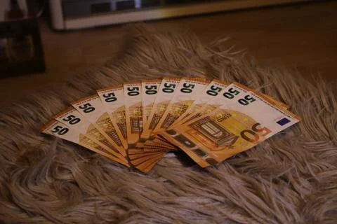 A small stack of money Stock Photos