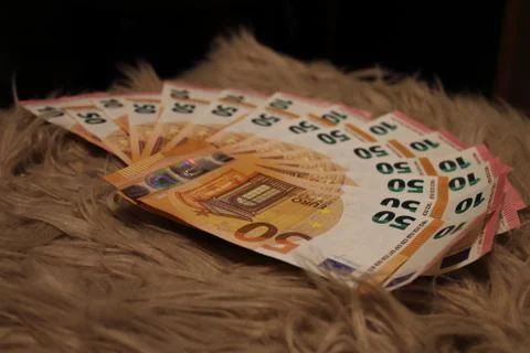 A small stack of money Stock Photos