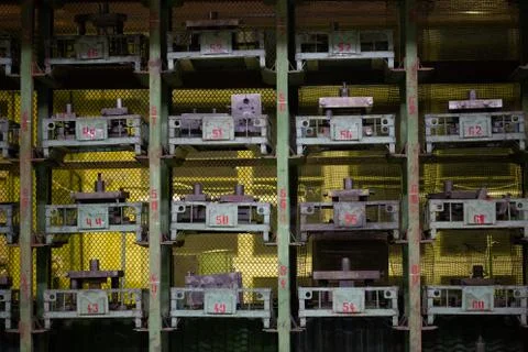 Small stamps storage rack in old factory 库存照片