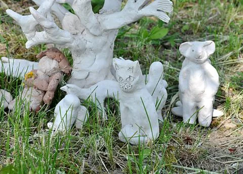 Small statue in garden Stock Photos