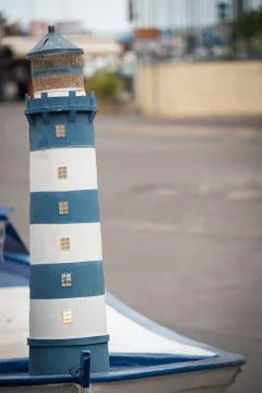 Small statue of lighthouse. Stock Photos