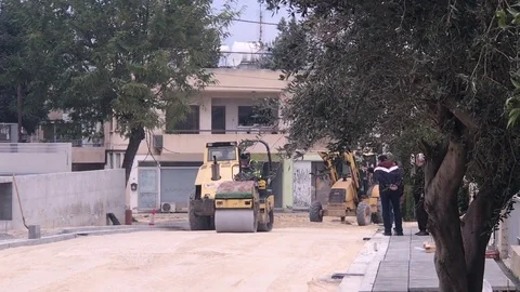 Small Steamroller Work in Road Construction Stock Footage 122947493