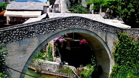 A small stone bridge with name Kriva Cuprija in Mostar. 動画素材 152955259