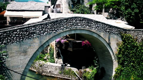 A small stone bridge with name Kriva Cuprija. Stock Footage 152955285
