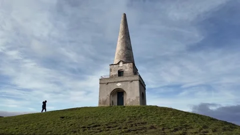 Small Stone Chapel on Green Hill in Ireland Stock Footage 327624907