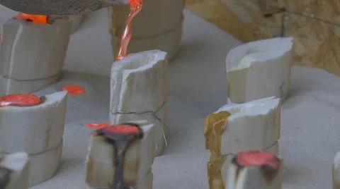 Small Stone Molds Stand on a Wide Table Stock Footage 64381398
