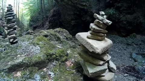 Small stone piles called cairns on touristic route in eastern Slovakia Stock Footage 93594911