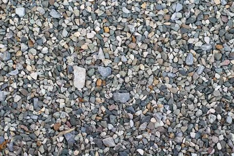 Small stone texture for background. Color gravel stones for the construction Stock Photos