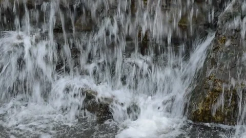 A small stone waterfall in the garden Stock Footage 196995109