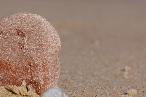 Small stones on the beach Stock Photos