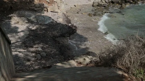 A small stony beach. Spanish beaches in Costa d'en Blanes. Mallorca Stock Footage 77111432