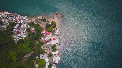 Small stony cape corner at shore, aerial view from height Stock Footage 77048422