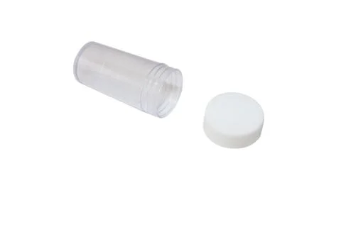 Small storage boxes with colorful caps 스톡 사진