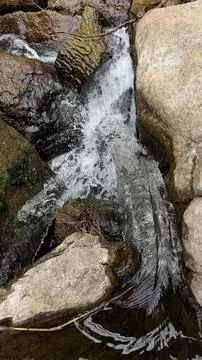 Small Stream Flowing Over Rocks Natural Water Cascade Closeup Stock Photos