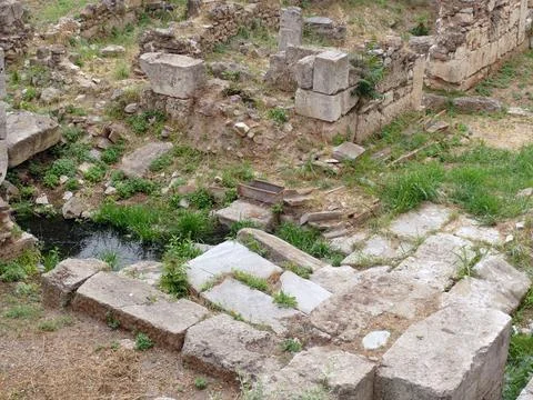 Small stream flowing through ancient ruins in Athens, Greece, showing histo.. Stock Photos