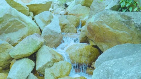 Small Stream Flowing Through Rocks | Peaceful Nature Sounds and Calming Scenery Stock Footage 286934110