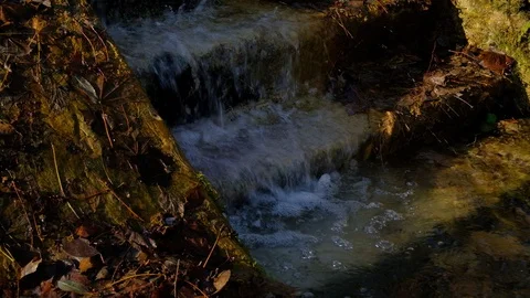 Small Stream Gently Tumbling Down Steps Stock Footage 121410620