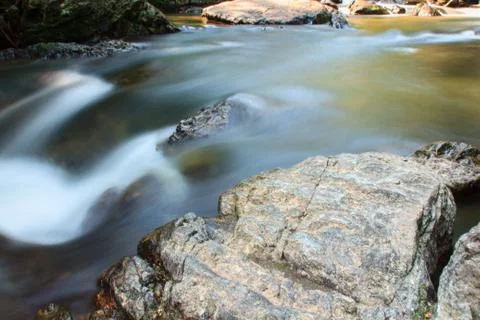 A small stream  with long exposure Stock Photos