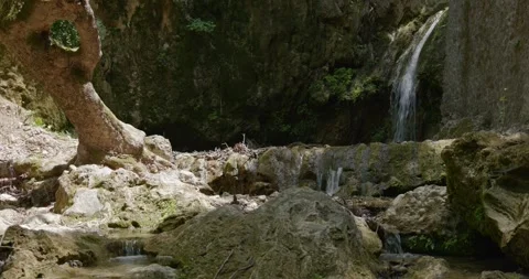 Small stream with a waterfall in the Valley of the Butterflies in Rhodes. Stock Footage 248693672