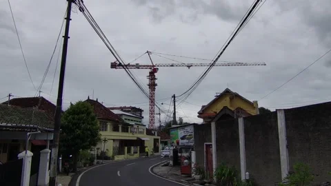 A Small Street with Crane for Construction Building in the Background Stock Footage 219300182
