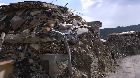 Small street lined with collapsed buildings Stock Footage 113625227