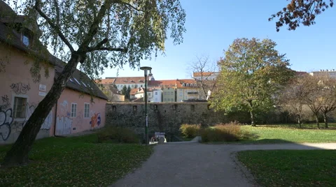 Small street with a passage under an old stonewall in Zagreb, Croatia Stock Footage 60843754