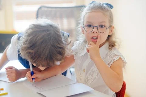 Small students at a lesson. Stock Photos