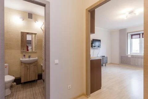 Small studio apartment and kitchen hightech interior Stock Photos