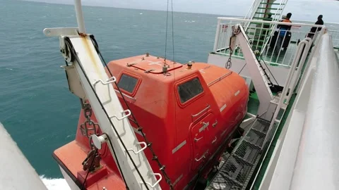 The small submarine that accompanies the ferry Stock Footage 234477647