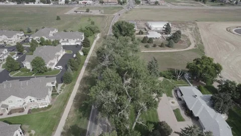 Small suburb on a county line road during summer Stock Footage 250368925