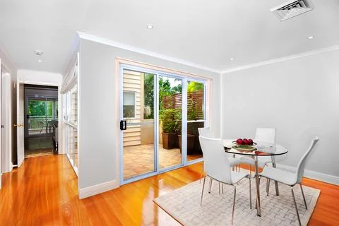 Small table in front of a terrace Stock Photos
