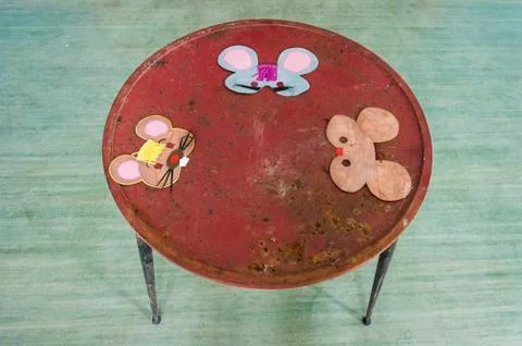 Small table with hand drawn mice Stock Photos