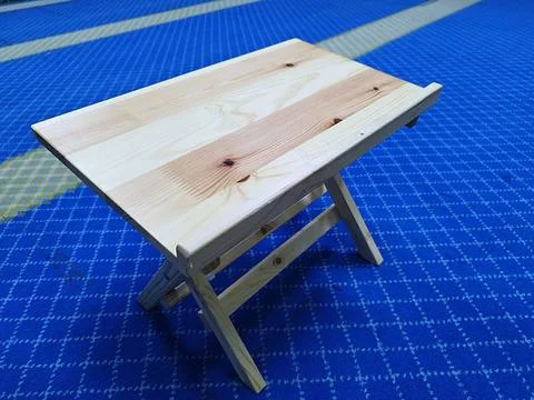 A small table made of a light white wood Stock Photos