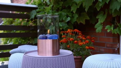 Small tabletop bio ethanol fueled portable glass fireplace burning giving heat. Stock-Footage 147329182
