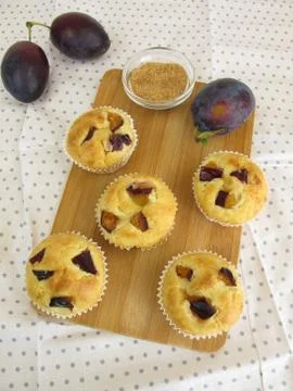 Small teacakes with plums Stock Photos