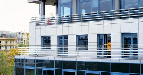 A Small Team of Office Workers Shaking Hands and Welcoming Each Other on Office Stock-Footage 129026374