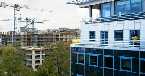 A Small Team of Office Workers Shaking Hands and Welcoming Each Other on Office Stock Footage 129026600