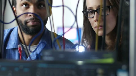 Small team works on servers together Stock Footage 49646804