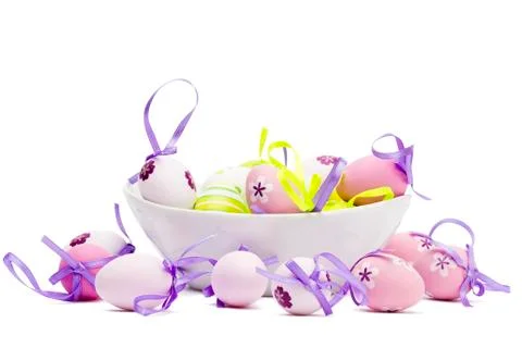 Small tender pastel easter eggs in a white bowl Stock Photos