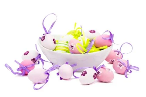 Small tender pastel easter eggs in a white bowl Stock Photos