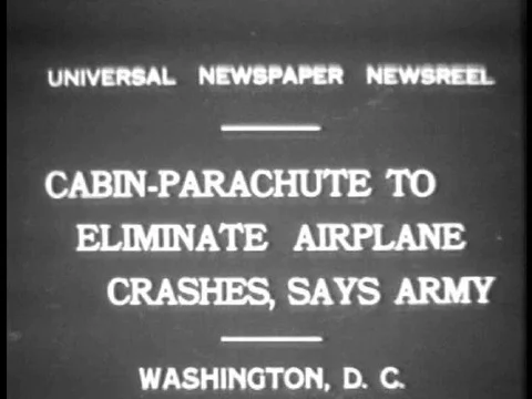 A small test airplane is tied to the top of an airplane in 1931 in Washington, Stock Footage 75769009