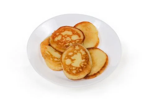 Small thick pancakes, so-called oladyi or oladky on dish Stock Photos