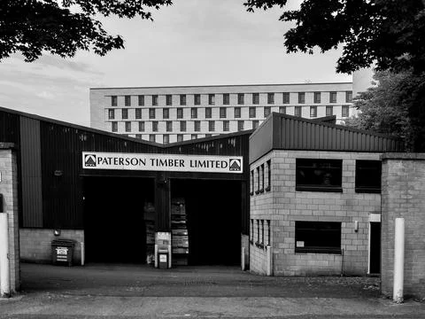 A small timber warehouse in the city Stock Photos